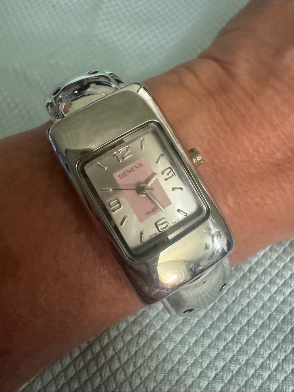 Geneva Silver-Tone and Perforated Bracelet Watch with Pink Accent Dial